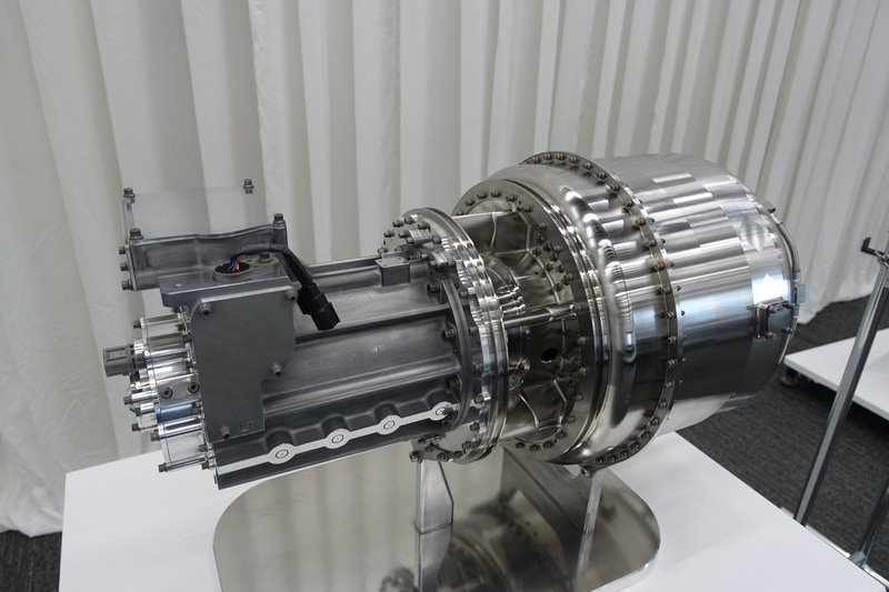 本田技術研究所 大津啓司社長 空飛ぶハイブリッド 電動垂直離着陸機 や 小型ロケット などホンダの新領域技術について説明 Car Watch